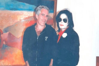 Jeffrey Epstein and Michael Jackson pose for a picture